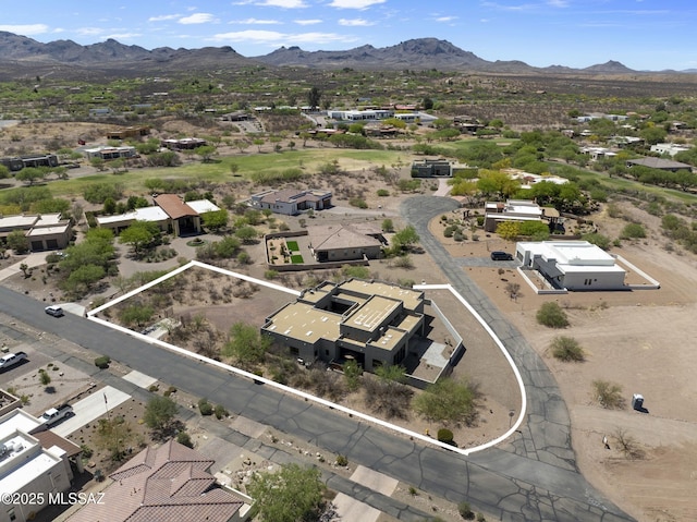 birds eye view of property with a residential view and a mountain view