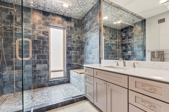 5920 N Campbell Ave, Tucson, AZ 85718 - bathroom with marble finish floors, a shower stall, and vanity