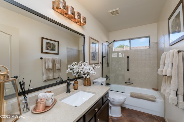 full bathroom featuring shower / bath combination, visible vents, tile patterned flooring, vanity, and toilet