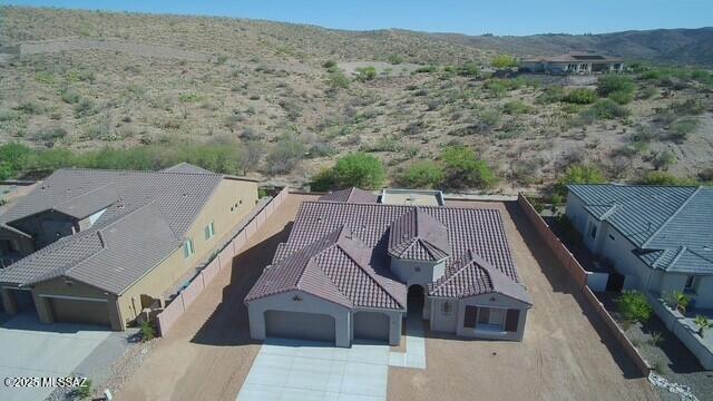 66414 E Peregrine Pl, Tucson, AZ 85739 - aerial view of property and surrounding area with a mountainous background