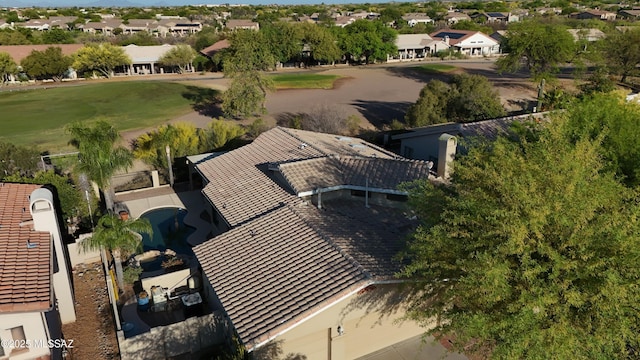 birds eye view of property with a residential view