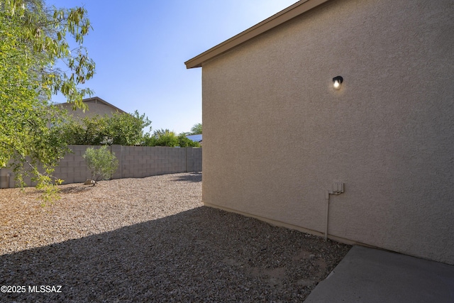 4249 E Cholla Desert Trl, Tucson, AZ 85706 - view of home's exterior with a fenced backyard and stucco siding