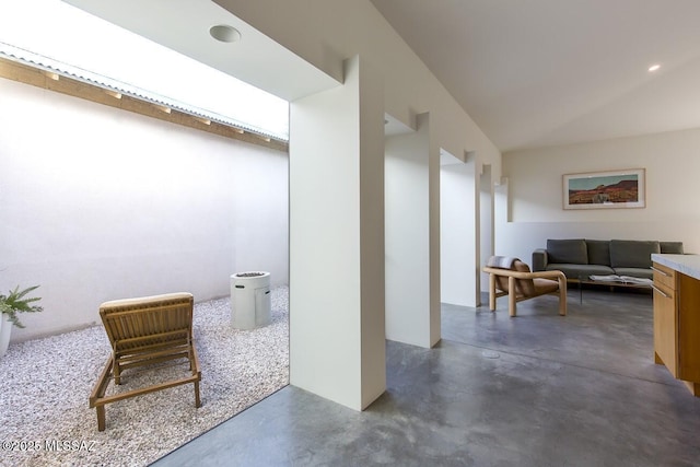 hall with finished concrete flooring
