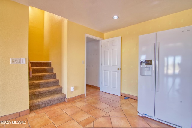 4050 S Melpomene Way, Tucson, AZ 85730 - staircase with recessed lighting and baseboards