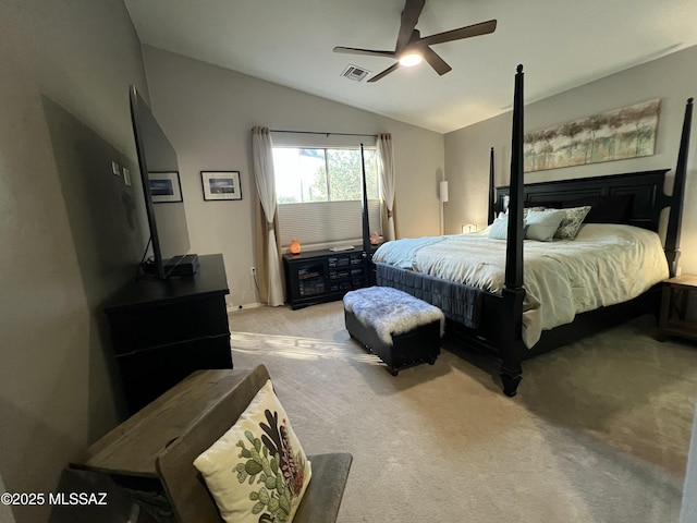 bedroom featuring a ceiling fan, lofted ceiling, light colored carpet, and visible vents
