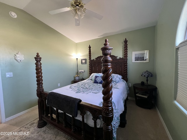bedroom featuring light colored carpet, baseboards, ceiling fan, and vaulted ceiling