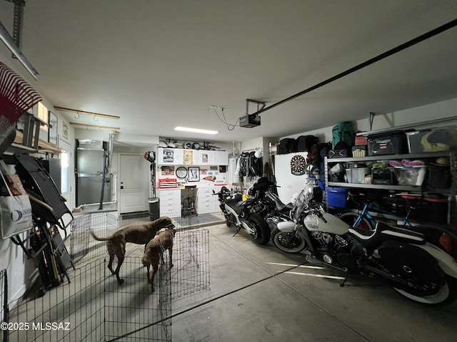 garage featuring a garage door opener