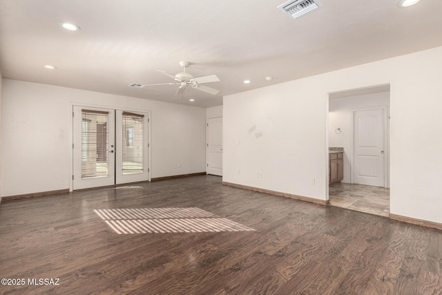 unfurnished room featuring visible vents, recessed lighting, and baseboards