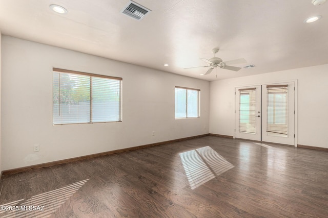 unfurnished room with visible vents, wood finished floors, baseboards, ceiling fan, and recessed lighting