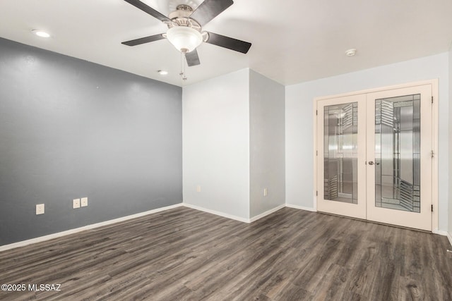 unfurnished room with baseboards, french doors, and wood finished floors