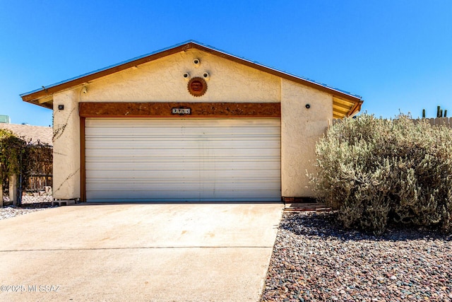 garage with driveway