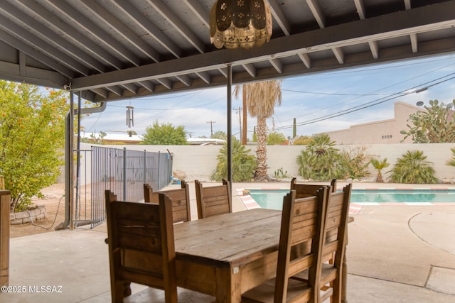 7302 E Placita Sinaloa, Tucson, AZ 85710 - fenced backyard with a patio area and outdoor dining area