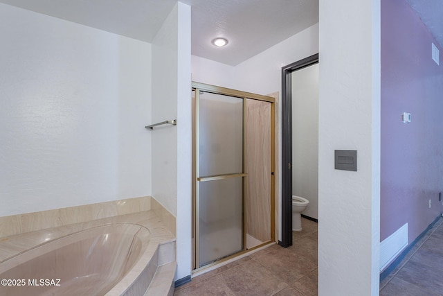 bathroom with a stall shower, toilet, visible vents, tile patterned flooring, and a garden tub