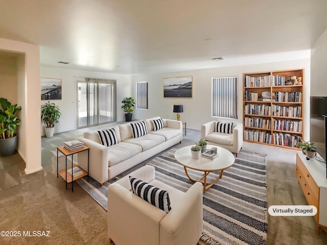 carpeted living room featuring visible vents