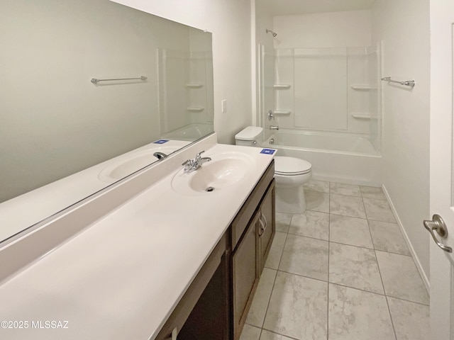 bathroom featuring bathtub / shower combination, vanity, toilet, marble finish floor, and baseboards