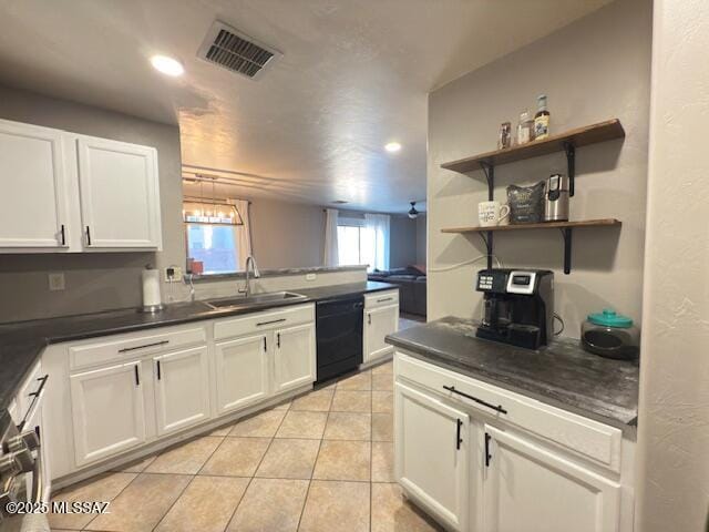 kitchen featuring visible vents, dark countertops, a sink, light tile patterned floors, and black dishwasher