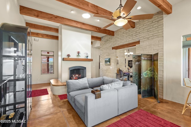 6300 N Abington Rd, Tucson, AZ 85743 - living area with beamed ceiling, ceiling fan, a large fireplace, a chandelier, and recessed lighting
