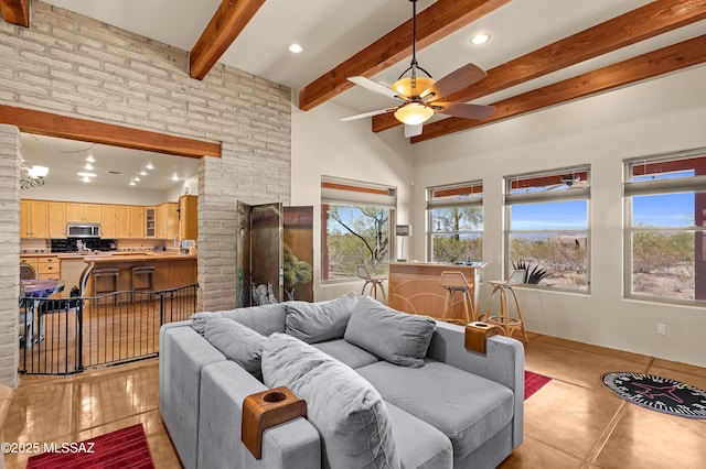 6300 N Abington Rd, Tucson, AZ 85743 - living area with a ceiling fan, beam ceiling, recessed lighting, and a high ceiling