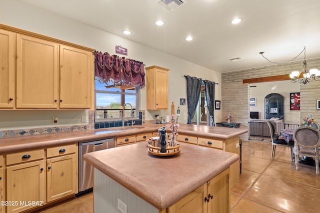 6300 N Abington Rd, Tucson, AZ 85743 - kitchen featuring dishwasher, a sink, light brown cabinets, a peninsula, and open floor plan