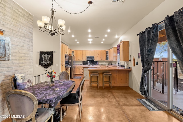 6300 N Abington Rd, Tucson, AZ 85743 - dining area featuring a chandelier, finished concrete floors, and recessed lighting