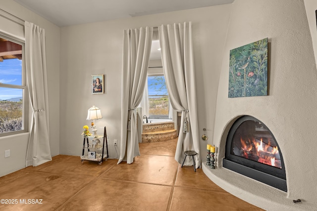 6300 N Abington Rd, Tucson, AZ 85743 - detailed view of finished concrete floors and a glass covered fireplace