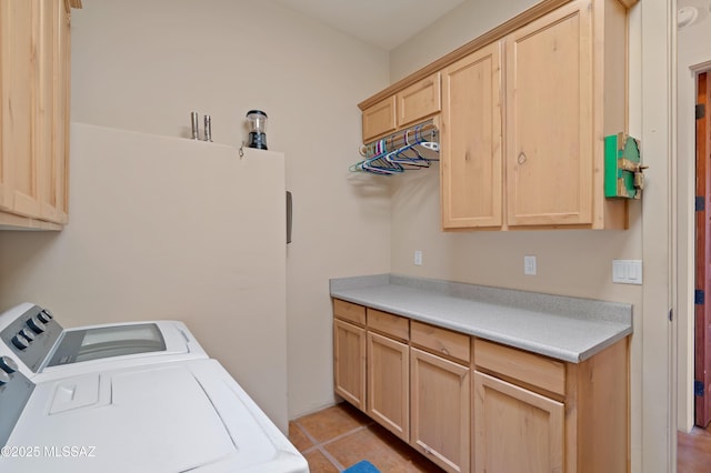 6300 N Abington Rd, Tucson, AZ 85743 - laundry room with washer and clothes dryer, cabinet space, and light tile patterned floors