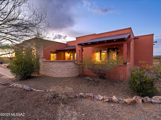 6300 N Abington Rd, Tucson, AZ 85743 - view of front of home with stucco siding