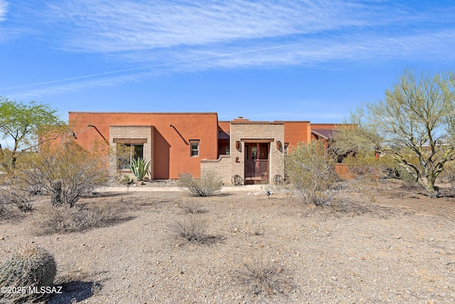 6300 N Abington Rd, Tucson, AZ 85743 - view of front of house with stucco siding and stone siding