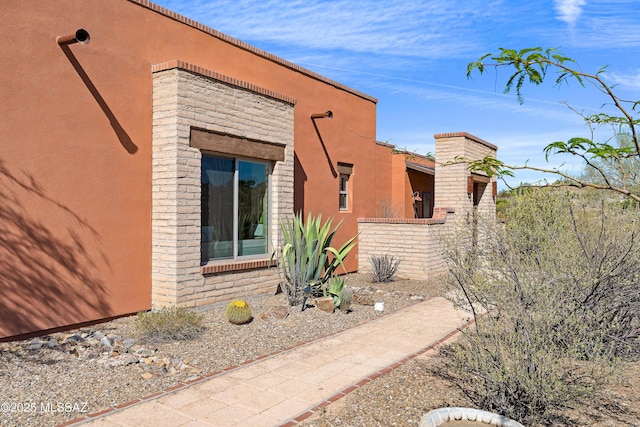 6300 N Abington Rd, Tucson, AZ 85743 - view of side of property with stucco siding