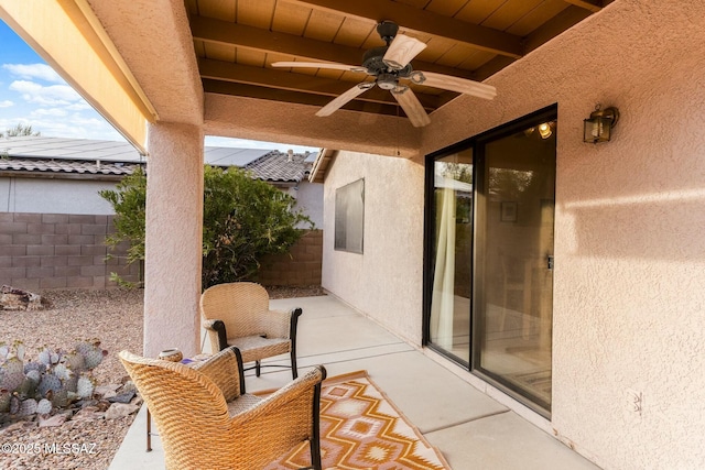view of patio / terrace with a fenced backyard and ceiling fan