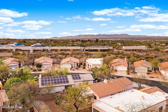 drone / aerial view with a residential view and a mountain view
