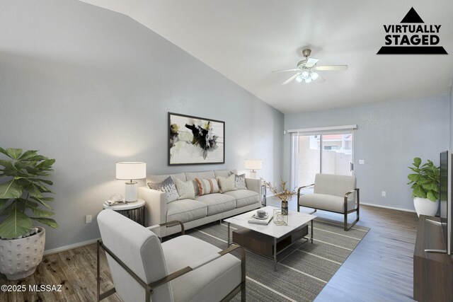 7848 E 35th St, Tucson, AZ 85710 - living room with vaulted ceiling, ceiling fan, wood finished floors, and baseboards