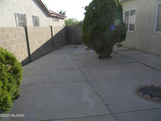 view of patio / terrace with fence