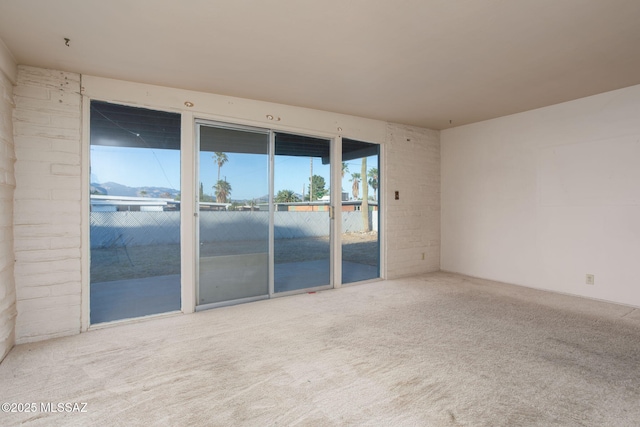 8133 E 6th St, Tucson, AZ 85710 - unfurnished room featuring carpet
