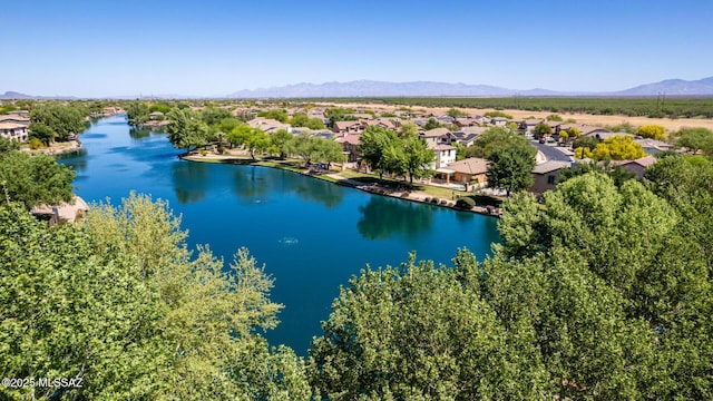 aerial view with a residential view and a water and mountain view