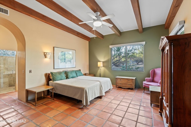 12431 E Cape Horn Dr, Tucson, AZ 85749 - bedroom with beam ceiling, light tile patterned flooring, and arched walkways