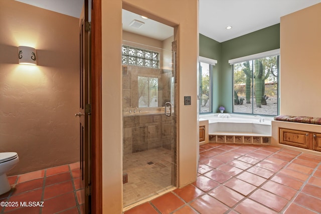 12431 E Cape Horn Dr, Tucson, AZ 85749 - full bathroom with toilet, a bath, a shower stall, tile patterned flooring, and recessed lighting