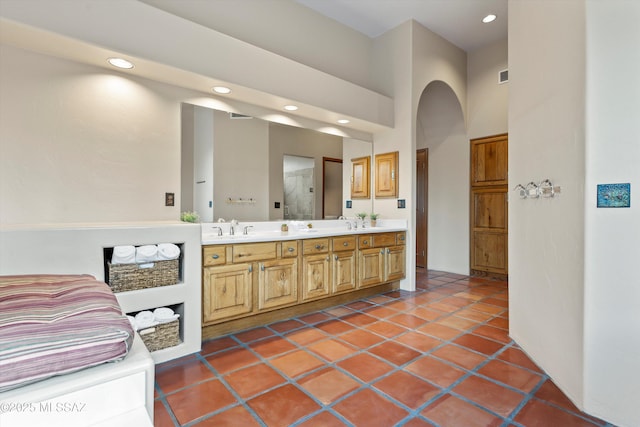 12431 E Cape Horn Dr, Tucson, AZ 85749 - full bathroom featuring double vanity, recessed lighting, and a shower
