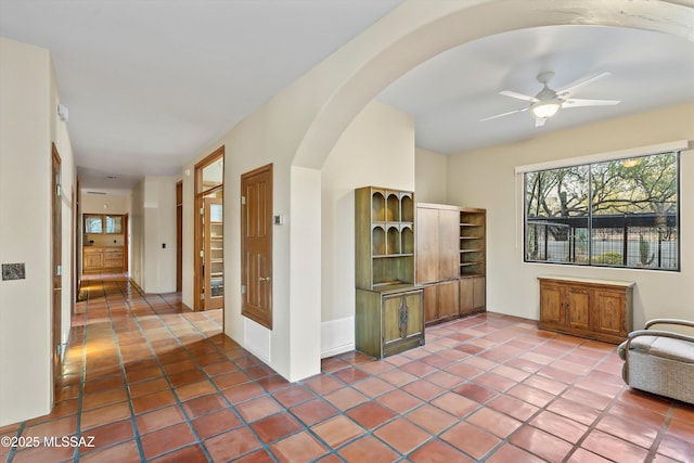 12431 E Cape Horn Dr, Tucson, AZ 85749 - interior space featuring arched walkways and tile patterned flooring