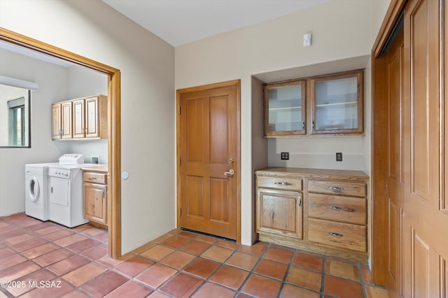 12431 E Cape Horn Dr, Tucson, AZ 85749 - laundry room featuring cabinet space and separate washer and dryer