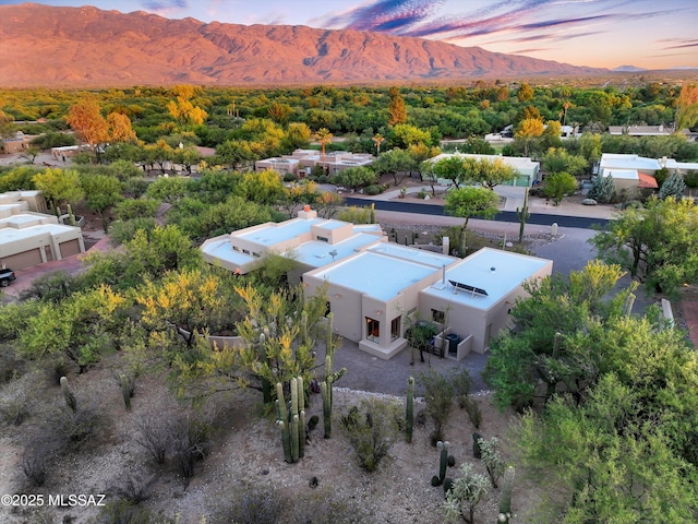 12431 E Cape Horn Dr, Tucson, AZ 85749 - aerial view at dusk of a mountain view
