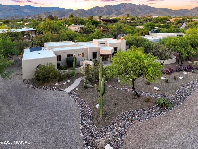 12431 E Cape Horn Dr, Tucson, AZ 85749 - southwest-style home featuring a mountain view and stucco siding