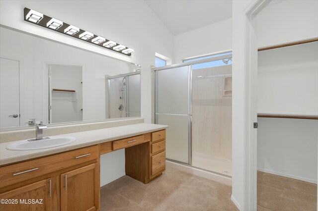 114 W Freddie Canyon Way, Oro Valley, AZ 85755 - full bath featuring vanity, a shower stall, and a walk in closet
