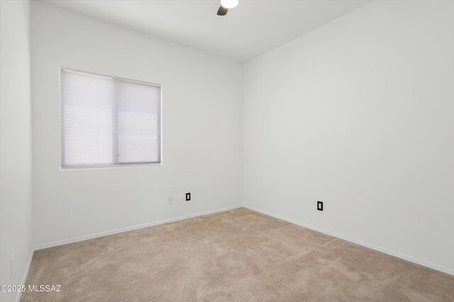 114 W Freddie Canyon Way, Oro Valley, AZ 85755 - spare room with ceiling fan, light colored carpet, and baseboards
