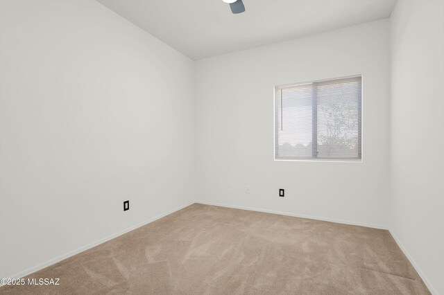 114 W Freddie Canyon Way, Oro Valley, AZ 85755 - empty room with ceiling fan, light carpet, and baseboards