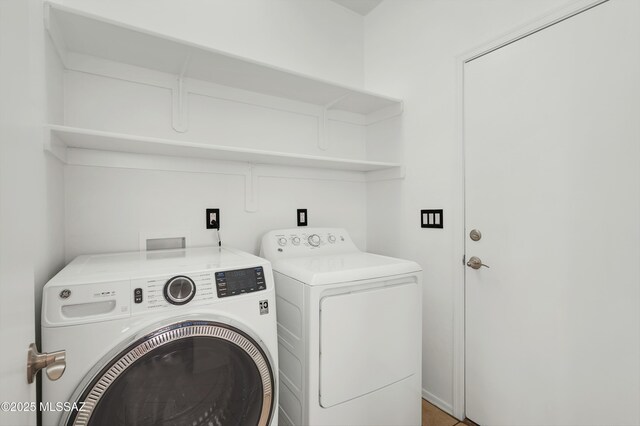 114 W Freddie Canyon Way, Oro Valley, AZ 85755 - clothes washing area with separate washer and dryer and laundry area