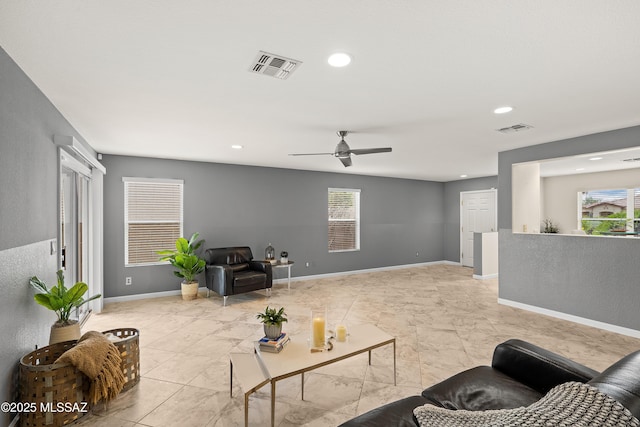 3486 W Sagebrush Hills Ct, Tucson, AZ 85741 - living area with recessed lighting, ceiling fan, and baseboards