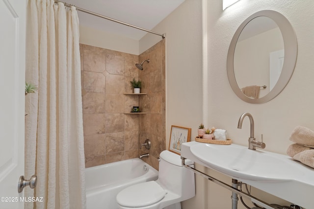 3486 W Sagebrush Hills Ct, Tucson, AZ 85741 - full bathroom featuring toilet, shower / bath combo with shower curtain, and a sink