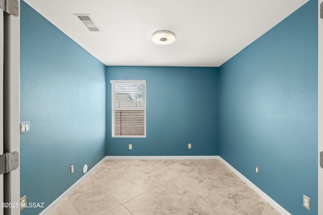 3486 W Sagebrush Hills Ct, Tucson, AZ 85741 - spare room with baseboards and marble look tiles