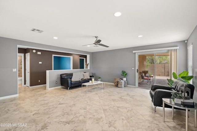 3486 W Sagebrush Hills Ct, Tucson, AZ 85741 - living room featuring a ceiling fan, recessed lighting, and baseboards